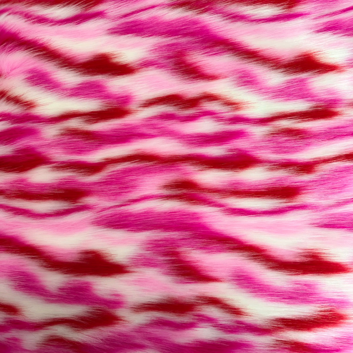 Pink faux fur fabrics by the meter/yard 